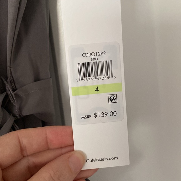 Brand new. Calvin Klein Commuter V-Neck Cropped Jumpsuit (Size 4) - Picture 6 of 7